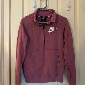 a dusty rose nike quarter zip. size small